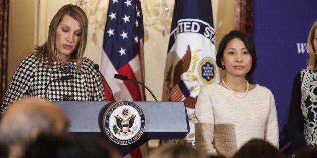 WASHINGTON, USA - MARCH 6: Sayaka Osakabe (R),founder and Representative of Matahara Net, is recognized for her exceptional courage and leadership in advocating for human rights, womens equality, and social progress at the 2015 International Women of Courage Award at the Department of State in Washington, D.C., USA on March 6, 2015. (Photo by Samuel Corum/Anadolu Agency/Getty Images)