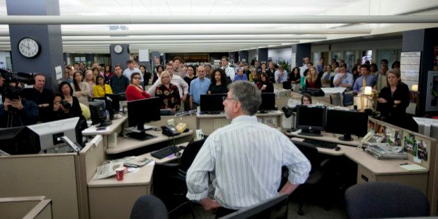 DORCHESTER, MA - NOVEMBER 13: The Boston Globe's Editor Martin Baron announces to the staff that he is leaving the Globe to become the Executive Editor of The Washington Post, in the Globe's newsroom in Dorchester, Mass. on Tuesday, Nov. 13, 2012. (Photo by Yoon S. Byun/The Boston Globe via Getty Images)