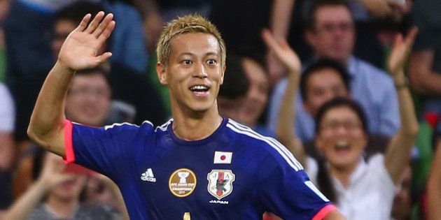 MELBOURNE, AUSTRALIA - JANUARY 20: Keisuke Honda of Japan celebrates after he scored a goal during the 2015 Asian Cup match between Japan and Jordan at AAMI Park on January 20, 2015 in Melbourne, Australia. (Photo by Robert Cianflone/Getty Images)