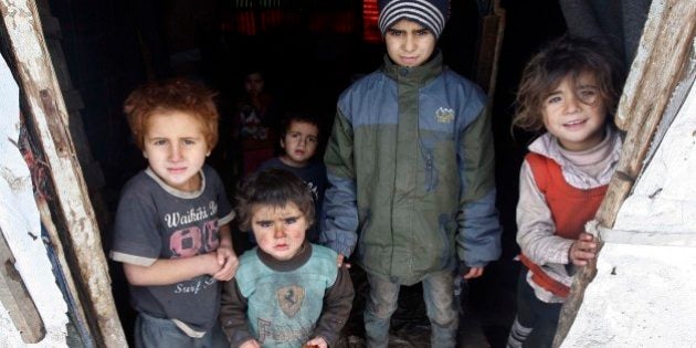 BEIRUT, LEBANON - JANUARY 09: Syrian refugees, fled their homes due to the civil war in their country, try to live under harsh living conditions at a refugee camp in Beirut, Lebanon on January 09, 2014. (Photo by Bilal Jawich/Anadolu Agency/Getty Images)