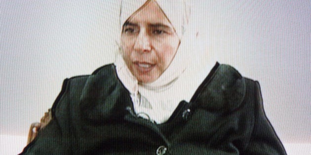 AMMAN, JORDAN - NOVEMBER 13. This frame grab from Jordanian state run TV taken on November 13, 2005 shows Iraqi Sajida Mubarek Atrous al-Rishawi confessing to her failed attempt to set off an explosives belt inside one of the three Amman hotels. The attacks on November 9 left at least 60 dead and injured over one hundred people. (Photo by Getty Images)