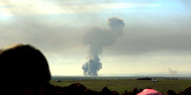 MOSUL, IRAQ - JANUARY 21: Air attacks are staged by coalition forces to Islamic State of Iraq and the Levant (ISIL) militants in Mawara town of Mosul, Iraq on January 21, 2015. Peshmerga forces continue to proceed in Mosul at helm of General Mansour Barzani, Peshmerga Special Forces Commander. Coalition forces give military support to Peshmerga. (Photo by Emrah Yorulmaz/Anadolu Agency/Getty Images)