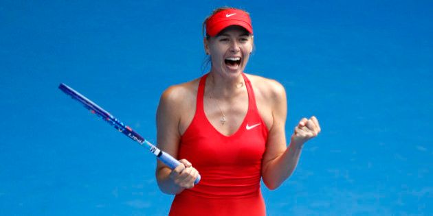 Maria Sharapova of Russia celebrates after defeating her compatriot Ekaterina Makarova in their semifinal match at the Australian Open tennis championship in Melbourne, Australia, Thursday, Jan. 29, 2015. (AP Photo/Vincent Thian)