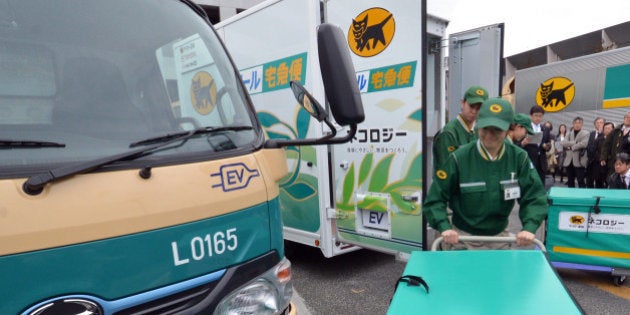 Japan's auto giant Toyota Motor and its subsidiary Hino Motors display the new electric trucks, a one-ton capacity and equipped with compartments to keep cool and frozen, in Tokyo on march 1, 2013. The EV truck, including its refrigator and freezer, is powered by Li-ion batteries, meaning it generates no emission during operation. Japan's delivery company Yamato Transport will start trial using of two EV trucks from middle of this month. AFP PHOTO / Yoshikazu TSUNO (Photo credit should read YOSHIKAZU TSUNO/AFP/Getty Images)