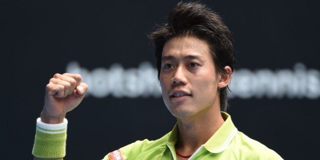 Japan's Kei Nishikori celebrates after victory in his men's singles match against Spain's Nicolas Almagro on day two of the 2015 Australian Open tennis tournament in Melbourne on January 20, 2015. AFP PHOTO / WILLIAM WEST-- IMAGE RESTRICTED TO EDITORIAL USE - STRICTLY NO COMMERCIAL USE (Photo credit should read WILLIAM WEST/AFP/Getty Images)