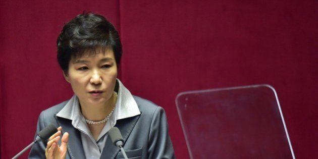 South Korean President Park Geun-Hye delivers her budget speech at the National Assembly in Seoul on October 29, 2014. Park vowed to make efforts to quickly clinch free trade deals with China, New Zealand and Vietnam, saying a free trade deal is a strong foothold in increasing South Korea's exports and expanding foreign investments. AFP PHOTO / JUNG YEON-JE (Photo credit should read JUNG YEON-JE/AFP/Getty Images)