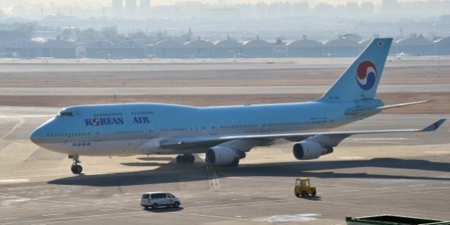 South Korea's Korean Air plane sits on the tarmac at Gimpo airport in Seoul on December 9, 2014. Korean Air apologised as it faced a media backlash over the daughter of the airline's CEO, who had a chief purser ejected from a plane in a furious reaction to being incorrectly served some macadamia nuts. AFP PHOTO / JUNG YEON-JE (Photo credit should read JUNG YEON-JE/AFP/Getty Images)