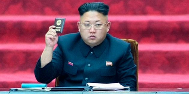 In this Wednesday, April 9, 2014 image made from video, North Korean leader Kim Jong Un holds up a parliament membership certificate during the Supreme People's Assembly in Pyongyang, North Korea. North Korea is declaring that the upcoming release of