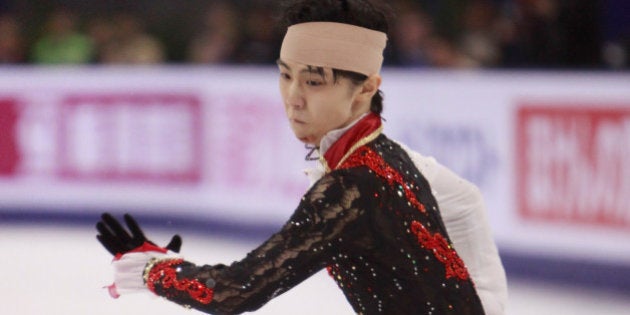 SHANGHAI, CHINA - NOVEMBER 08: Yuzuru Hanyu of Japan skates in Men Free Skating during the Lexus Cup of China 2014 on November 8, 2014 in Shanghai, China. (Photo by Kevin Lee/Getty Images)