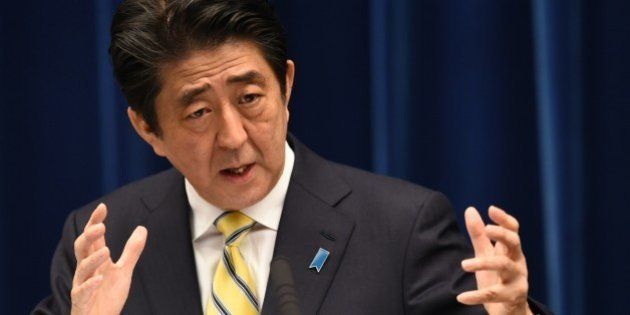 Japan's Prime Minister Shinzo Abe speaks during a press conference at his official residence in Tokyo on November 21, 2014. The lower chamber of Japan's parliament was dissolved earlier in the day on November 21 in readiness for a general election, expected next month, as Prime Minister Shinzo Abe seeks to consolidate his grip on power. AFP PHOTO / TOSHIFUMI KITAMURA (Photo credit should read TOSHIFUMI KITAMURA/AFP/Getty Images)