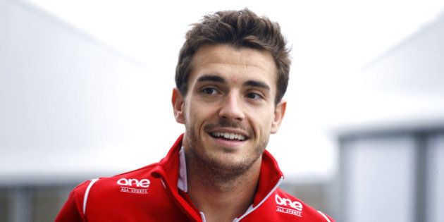 SUZUKA, JAPAN - OCTOBER 05: Jules Bianchi of France and Marussia arrives for the drivers' parade prior to the Japanese Formula One Grand Prix at Suzuka Circuit on October 5, 2014 in Suzuka, Japan. (Photo by Jiri Krenek/isifa/Getty Images)
