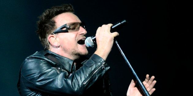 Lead singer Bono of Irish band U2 performs during their 360 Degree Tour at Athen's Olympic stadium, Greece, on Friday, Sept. 3, 2010. (AP Photo)