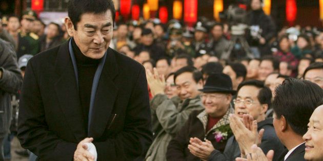LIJIANG, CHINA - DECEMBER 16: (CHINA OUT) Japanese actor Ken Takakura attends the premiere of Chinese director Zhang Yimou's new movie 'Riding Alone for Thousands of Miles' on December 16, 2005 in ancient town Lijiang of Yunnan Province, China. (Photo by China Photos/Getty Images)