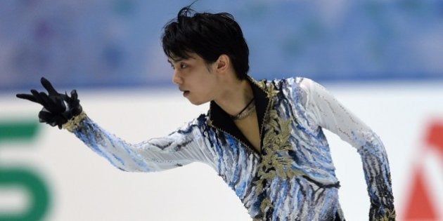 Yuzuru Hanyu of Japan performs during the men's singles free skating at the NHK Trophy ISU Grand Prix figure skating 2014 in Osaka on November 29, 2014. AFP PHOTO / TOSHIFUMI KITAMURA (Photo credit should read TOSHIFUMI KITAMURA/AFP/Getty Images)