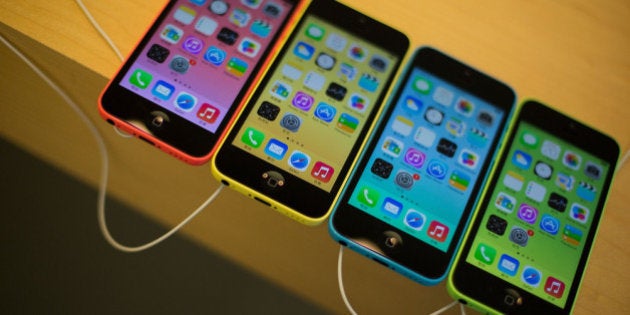 HONG KONG - SEPTEMBER 20: The new iPhone 5C is displayed inside Apple's store in Causeway Bay district on September 20, 2013 in Hong Kong, China Hong Kong was one of the first places in the world where can purchase the new iPhone 5s and iPhone 5C models (Photo by Lam Yik Fei/Getty Images)