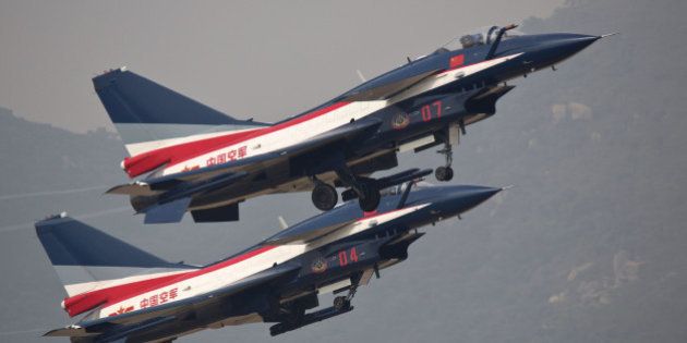 ZHUHAI, CHINA - NOVEMBER 11: (CHINA OUT) J10 perform in the air during the 10th China International Aviation & Aerospace Exhibition on November 11, 2014 in Zhuhai, Guangdong province of China. The 10th China International Aviation & Aerospace Exhibition organized by Zhuhai Airshow Co., Ltd. is being held until November 16 in Zhuhai. (Photo by ChinaFotoPress/ChinaFotoPress via Getty Images)