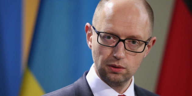 BERLIN, GERMANY - MAY 28: Interim Ukrainian Prime Minister Arseniy Yatsenyuk, along with German Chancellor Angela Merkel, Moldovan Prime Minister Iurie Leanca and Georgian Prime Minister Irakli Garibashvili (all three not pictured), give statements to the media at the Chancellery on May 28, 2014 in Berlin, Germany. The four leaders are meeting to discuss the ongoing conflict in eastern Ukraine. (Photo by Sean Gallup/Getty Images)