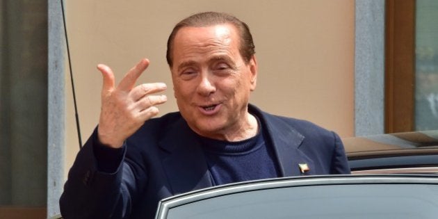 Italian former Prime Minister Silvio Berlusconi leaves the Catholic hospice 'Sacra Famiglia' (Holy Family...