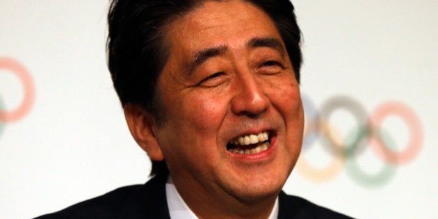 BUENOS AIRES, ARGENTINA - SEPTEMBER 07: Prime Minister of Japan Shinzo Abe speaks as he signs the host city contract after Tokyo is awarded the 2020 Summer Olympic Games during the 125th IOC Session - 2020 Olympics Host City Announcement at Hilton Hotel on September 7, 2013 in Buenos Aires, Argentina. (Photo by Scott Halleran/Getty Images)