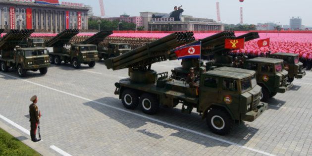 North Korean rocket launchers pass through Kim Il-Sung square during a military parade marking the 60th anniversary of the Korean war armistice in Pyongyang on July 27, 2013. North Korea mounted its largest ever military parade on July 27 to mark the 60th anniversary of the armistice that ended fighting in the Korean War, displaying its long-range missiles at a ceremony presided over by leader Kim Jong-Un. AFP PHOTO / Ed Jones (Photo credit should read Ed Jones/AFP/Getty Images)