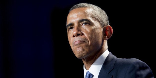 U.S. President Barack Obama pauses while speaking at the Democratic National Committee's (DNC) annual Women's Leadership Forum in Washington, D.C., U.S., on Friday, Sept. 19, 2014. Speaking at an event today at the White House, President Obama rolled out the 'It's On Us' campaign to encourage college students, especially men, to speak out against and prevent sexual assault on campuses. Photographer: Andrew Harrer/Bloomberg via Getty Images