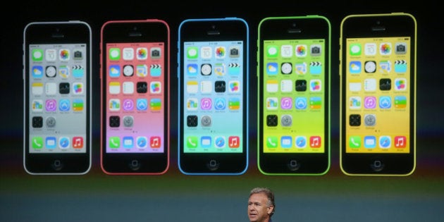 CUPERTINO, CA - SEPTEMBER 10: Apple Senior Vice President of Worldwide Marketing Phil Schiller speaks about the new iPhone 5C during an Apple product announcement at the Apple campus on September 10, 2013 in Cupertino, California. The company launched the new iPhone 5C model that will run iOS 7 is made from hard-coated polycarbonate and comes in various colors. (Photo by Justin Sullivan/Getty Images)