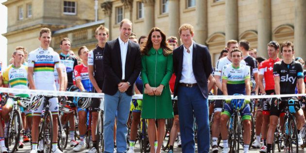 LEEDS, ENGLAND - JULY 05: (l to r) Prince William, Duke of Cambridge, Catherine, Duchess of Cambridge and Prince Harry pose at the official start of stage one of the 2014 Tour de France, a 190km stage between Leeds and Harrogate, on July 5, 2014 in Leeds, England. (Photo by Bryn Lennon/Getty Images)