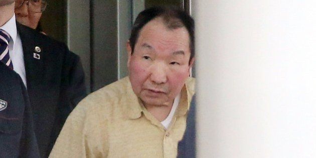 Former boxer Iwao Hakamada, 78, who has been on death row in Japan for 48 years, is released from a Tokyo detention center on March 27, 2014. Hakamada, believed to be the world's longest-serving death row inmate, was granted a retrial on March 27 after decades in solitary confinement, in a rare about-face for Japan's rigid justice system. JAPAN OUT AFP PHOTO / JIJI PRESS (Photo credit should read JIJI PRESS/AFP/Getty Images)