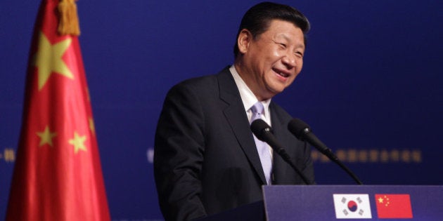 SEOUL, SOUTH KOREA - JULY 04: Chinese President Xi Jinping speaks during a Korea-China Investment Forum at Shilla Hotel on July 4, 2014 in Seoul, South Korea. President Xi Jinping is visiting Seoul before Pyongyang during his first trip to Korean Peninsula as Chinese President. (Photo by Chung Sung-Jun/Getty Images)