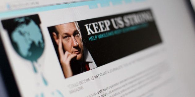 A picture taken on December 3, 2010 in Paris shows a page of the website WikiLeaks featuring its founder Julian Assange. The noose tightened around WikiLeaks as cyber attacks temporarily forced the whistleblowing website off the Internet and its elusive founder Assange faced a fresh arrest warrant. AFP PHOTO THOMAS COEX (Photo credit should read THOMAS COEX/AFP/Getty Images)