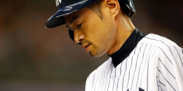 NEW YORK, NY - JUNE 27: Ichiro Suzuki #31 of the New York Yankees goes back to the dugout after flying out in the sixth inning against the Boston Red Sox at Yankee Stadium on June 27, 2014 in the Bronx borough of New York City. (Photo by Jim McIsaac/Getty Images)