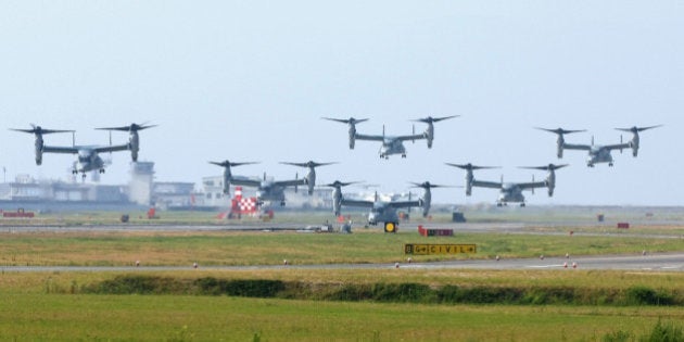 IWAKUNI, JAPAN - AUGUST 12: (CHINA OUT, SOUTH KOREA OUT) MV-22 Osprey aircrafts take off at the U.S. Marine Corps Iwakuni Air Station in Yamaguchi Prefecture heading for the U.S Marine Corps' Futenma Air Station in Okinawa prefecture on August 12, 2013 in Iwakuni, Japan. (Photo by The Asahi Shimbun via Getty Images)