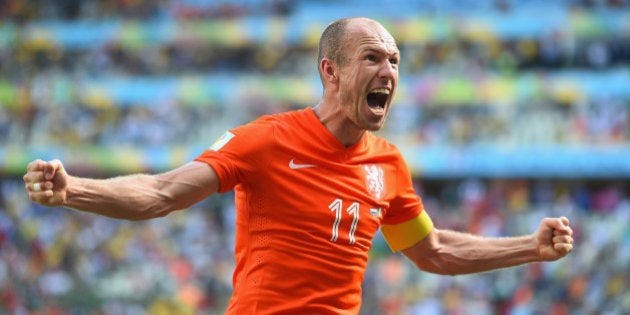 FORTALEZA, BRAZIL - JUNE 29: Arjen Robben of the Netherlands celebrates after defeating Mexico 2-1 during...