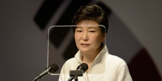 South Korea's President Park Geun-Hye speaks during a ceremony marking the 69th anniversary of the country's independence from Japanese colonial rule, in Seoul on August 15, 2014. During her speech Park urged North Korea to accept Seoul's offer for high-level talks, while condemning a recent series of 'intolerable' rocket launches by the nuclear-armed neighbour. AFP PHOTO / Ed Jones (Photo credit should read ED JONES/AFP/Getty Images)