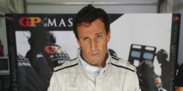 DOHA, QATAR - APRIL 27: Andrea DeCesaris of Italy in the pits during second practice prior to the Grand Prix Masters race at the Losail International Circuit on April 27, 2006, in Doha, Qatar. (Photo by Clive Mason/Getty Images)