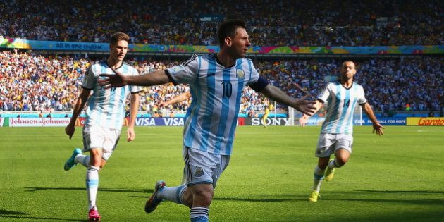 BELO HORIZONTE, BRAZIL - JUNE 21: Lionel Messi of Argentina celebrates scoring his team's first goal during the 2014 FIFA World Cup Brazil Group F match between Argentina and Iran at Estadio Mineirao on June 21, 2014 in Belo Horizonte, Brazil. (Photo by Ronald Martinez/Getty Images)