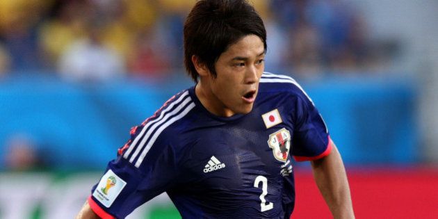 CUIABA, BRAZIL - JUNE 24: Atsuto Uchida of Japan controls the ball during the 2014 FIFA World Cup Brazil Group C match between Japan and Colombia at Arena Pantanal on June 24, 2014 in Cuiaba, Brazil. (Photo by Adam Pretty/Getty Images)