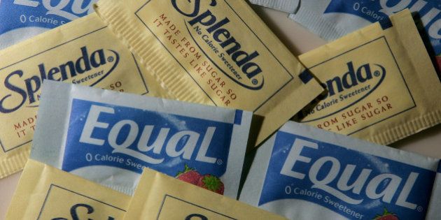 SAN RAFAEL, CA - APRIL 9: Packages of Equal and Splenda artificial sweeteners are displayed at a coffee shop April 9, 2007 in San Rafael, California. Merisant, the maker of Equal filed a lawsuit today against McNeil Nutritionals, the maker of Splenda, citing that Splenda's advertising is misleading consumers to believe that the sweetener is all natural and made from sugar. McNeil Nutritionals claims that Splenda does originate from sugar. (Photo illustration by Justin Sullivan/Getty Images)