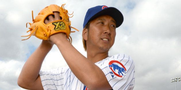 SCOTTSDALE, AZ - FEBRUARY 21: Kyuji Fujikawa #11 of the Chicago Cubs poses during a portrait session on February 21, 2013 in Scottsdale, Arizona. (Photo by Robert Binder/MLBPA via Getty Images)