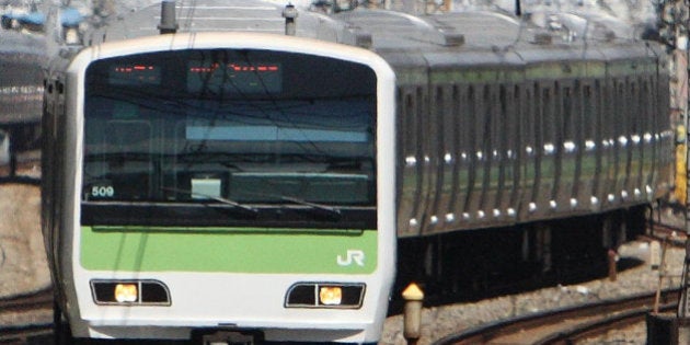 JAPAN - APRIL 01: East Japan Railway Co.'s Yamanote-line train approaches Tokyo Station in Tokyo, Japan, on Tuesday, April 1, 2008. East Japan Railway Co., the nation's largest rail operator, rose the most in two weeks in Tokyo trading after it forecast an increase in operating profit of 19 percent over the next three fiscal years. (Photo by Tomohiro Ohsumi/Bloomberg via Getty Images)