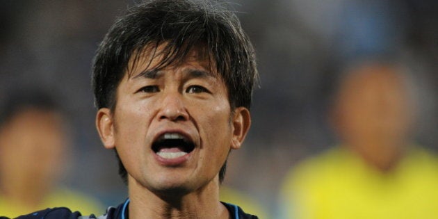 YOKOHAMA, JAPAN - AUGUST 25: (EDITORIAL USE ONLY) Kazuyoshi Miura #11 of Yokohama FC looks on prior to the J.League second division match between Yokohama FC and Gamba Osaka at Nippatsu Mitsuzawa Stadium on August 25, 2013 in Yokohama, Kanagawa, Japan. (Photo by Masashi Hara/Getty Images)