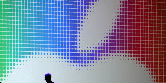 SAN FRANCISCO, CA - JUNE 02: Apple CEO Tim Cook walks off stage after speaking during the Apple Worldwide Developers Conference at the Moscone West center on June 2, 2014 in San Francisco, California. Tim Cook kicked off the annual WWDC which is typically a showcase for upcoming updates to Apple hardware and software. The conference runs through June 6. (Photo by Justin Sullivan/Getty Images)