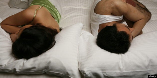 INDIA - JULY 16: Models for the Sexless and the City in New Delhi, India (Couple in Badroom, Failing Libido, Sex, Health, Model, Sleeping) (Photo by Hemant Chawla/The India Today Group/Getty Images)