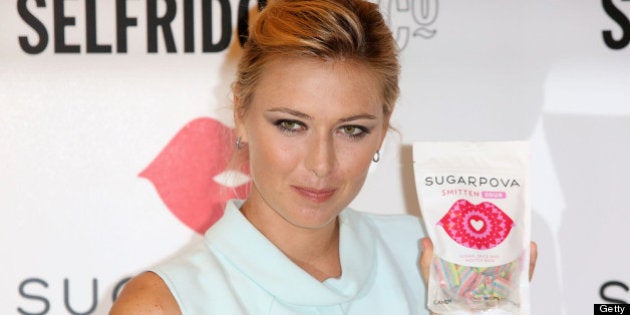 LONDON, ENGLAND - JUNE 20: Maria Sharapova poses at a photocall to launch her new range of candy 'Sugapova' at Selfridges on June 20, 2013 in London, England. (Photo by Tim P. Whitby/Getty Images)