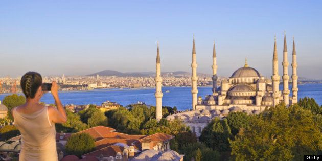Also known as the Sultan Ahmet Mosque; the Bosphorus is visible beyond.