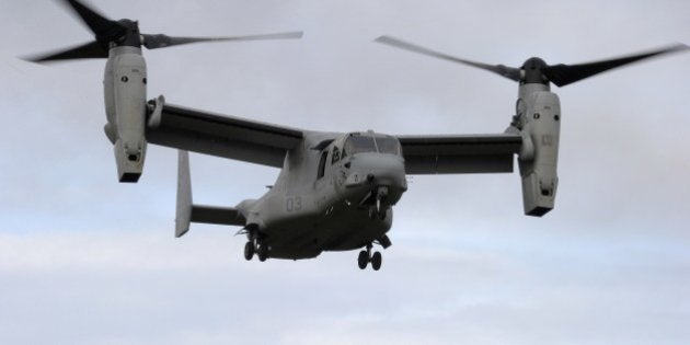 TO GO WITH AFP STORY BY REMY ZAKAAn American multi-mission and tiltrotor aircraft MV-22 Osprey, is pictured during a Franco-American military exercise called 'Garrigues Fury 2014' with soldiers of the US Special Purpose Marine Air Ground Task Force for Crisis Response, (SPMAGTF-CR), and soldiers of the French 21st Marine Infantry Regiment (RIMa) on February 13, 2014 at the military camp of Garrigues, near Nimes, southern France. The SPMAGTF-CR, was created after the armed attack against the U.S. consulate in Benghazi, Libya, in September 2012, in which four people, including the U.S. ambassador, perished. The mission of SPMAGTF-CR is to intervene rapidly in Africa. The objective of the exercise is to share the techniques and methods of action used in urban warfare. A AFP PHOTO / PASCAL GUYOT (Photo credit should read PASCAL GUYOT/AFP/Getty Images)