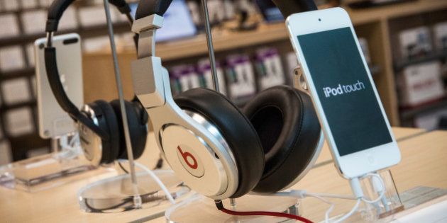 NEW YORK, NY - MAY 09: Beats headphones are sold along side iPods in an Apple store on May 9, 2014 in New York City. Apple is rumored to be consideringing buying the headphone company for $3.2 billion. (Photo by Andrew Burton/Getty Images)
