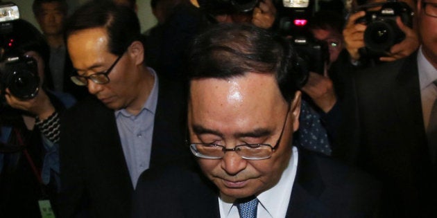 SEOUL, SOUTH KOREA - APRIL 27: (SOUTH KOREA OUT) South Korean Prime Minister Chung Hong-Won leaves from the Central Government Complex on April 27, 2014 in Seoul, South Korea. Chung Hong-won offered his resignation responding to the criticism over the government's response to the 16 April ferry accident. (Photo by Park Young-Dae-Donga Daily via Getty Images)