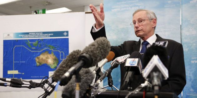 CANBERRA, AUSTRALIA - MARCH 20: Australian Maritime Safety Authority Emergency Response Division General Manager John Young speaks to the media about satelite imagery of objects possibly related to the search for Malaysian Airlines flight MH370 March 20, 2014 in Canberra, Australia. Two objects possibly connected to the search for the passenger liner, missing for nearly two weeks after disappearing on a flight from Kuala Lumpur, Malaysia to Beijing, have been spotted in the southern Indian Ocean. (Photo by Stefan Postles/Getty Images)