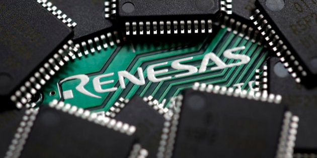 A Renesas Electronics Corp. central processing unit (CPU) board and microcontrollers are arranged for a photograph in Soka City, Saitama Prefecture, Japan, on Saturday, June 23, 2012. Renesas said it reached a basic agreement to receive support from its largest shareholders, while the company's major lenders will provide additional funding, as it seeks to recover from losses. Photographer: Kiyoshi Ota/Bloomberg via Getty Images